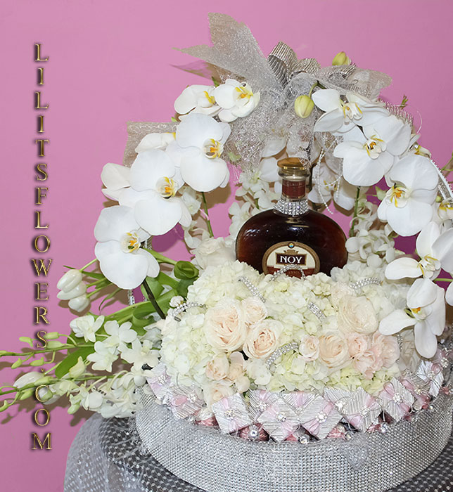 Engagement gift basket with brandy - whtie flowers chocolate and brandy gift basket.
Make sure to share with us your arrangement.
https://goo.gl/maps/Jgj1JeCetJv - gorgeous flowers - Glendale Florist 