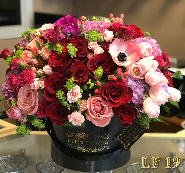  Florist in Sherman Oaks Flower Delivery - This beautiful bouquet of ranunculus, roses and orchids will be a charm in any room. 
Sherman Oaks Florist is the premier online flower shop for the Sherman Oaks and the surrounding towns. Order flowers online from Sherman Oaks Florist for same day local flower delivery from conveniently located shops in Southern California to send flowers to Sherman Oaks, Los Angeles,  Hollywood, Echo Park, Silver Lake, Atwater Village, Burbank, Sherman Oaks, La Cañada, Flintridge, Pasadena, San Marino, Alhambra, Arcadia, Thousand Oaks, Tarzana, Tujunga, La Crescenta,Toluca Lake and more. - ravishing floral arrangement - Sherman Oaks Florist