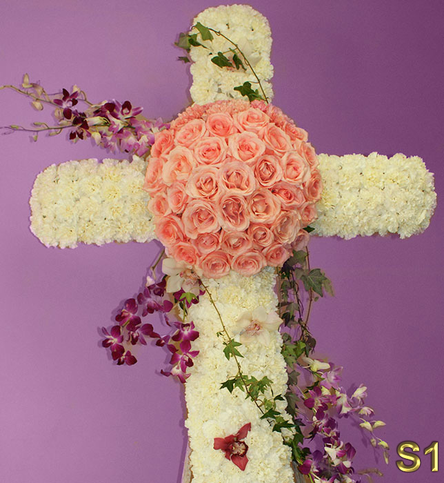 Funeral Florist in Glendale Flower Delivery -  beautiful flower 
                                                    arrangement funeral cross with pink roses, white carnations and more
                                                    Make sure to share with us your arrangement.
                                                    https://goo.gl/maps/Jgj1JeCetJv - Glendale Funeranl Florist pink roses