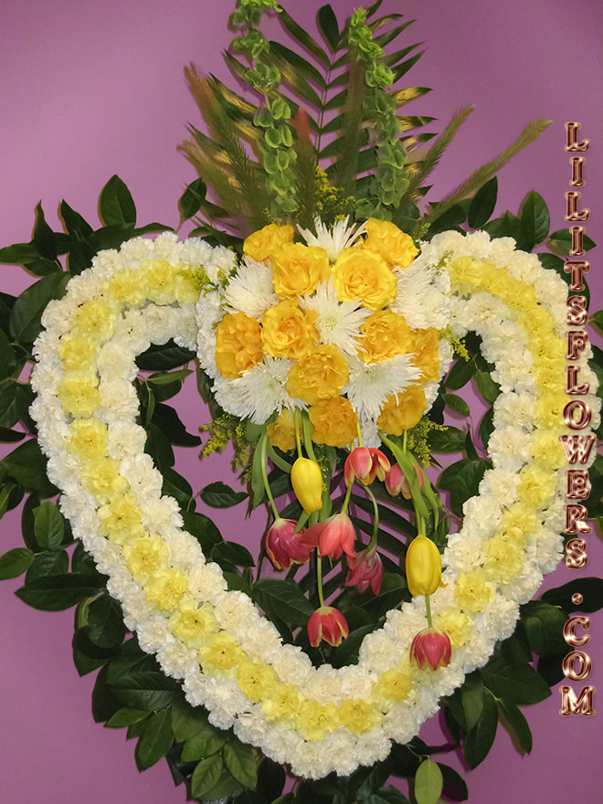 Sympathy Florist in Glendale Flower Delivery -open heart white and yellow carnations, tulips, yellow roses
Lilit's Flowers is the premier sympathy flower shop for the Glendale and the surrounding towns. Order flowers online from Glendale Florist for same day local flower delivery from conveniently located shops in Southern California to send flowers to Glendale, Los Angeles,  Hollywood, Echo Park, Silver Lake, Atwater Village, Burbank, Sherman Oaks, La Cañada, Flintridge, Pasadena, San Marino, Alhambra, Arcadia, Thousand Oaks, Tarzana, Tujunga, La Crescenta,Toluca Lake and more.

Make sure to share with us your arrangement.
 https://goo.gl/maps/Jgj1JeCetJv - open heart with white and yellow carnations - Glendale Sympathy Florist
