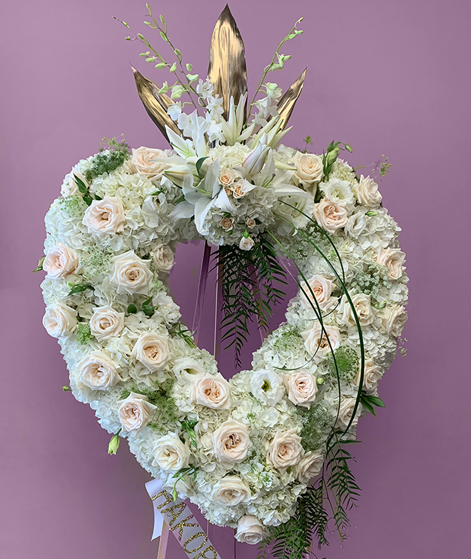 Funeral Florist in Los Angeles, CA Flower Delivery - beautiful heart  - beautiful heart composed of white roses and white hydrengeas-
Lilit's Flowers is the premier sympathy flower shop for Los Angeles, CA and the surrounding towns. Order flowers online from Glendale Florist for same day local flower delivery from conveniently located shops in Southern California to send flowers to Glendale, Los Angeles,  Hollywood, Echo Park, Silver Lake, Atwater Village, Burbank, Sherman Oaks, La Cañada, Flintridge, Pasadena, San Marino, Alhambra, Arcadia, Thousand Oaks, Tarzana, Tujunga, La Crescenta,Toluca Lake and more.

Make sure to share with us your arrangement.
 https://goo.gl/maps/Jgj1JeCetJv - white spray - sympathy flowers Los Angeles, CA